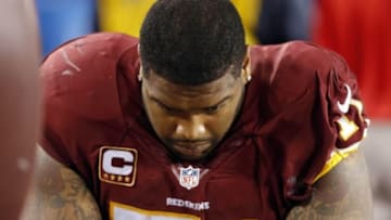 Sep 25, 2014; Landover, MD, USA; Washington Redskins tackle Trent Williams (71) sits on the bench after being injured against the New York Giants in the third quarter at FedEx Field. The Giants won 45-14. Mandatory Credit: Geoff Burke-USA TODAY Sports