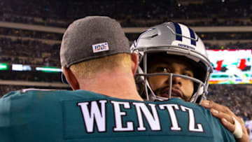 PHILADELPHIA, PA - DECEMBER 22: Carson Wentz #11 of the Philadelphia Eagles and Dak Prescott #4 of the Dallas Cowboys embrace after the game at Lincoln Financial Field on December 22, 2019 in Philadelphia, Pennsylvania. (Photo by Mitchell Leff/Getty Images)