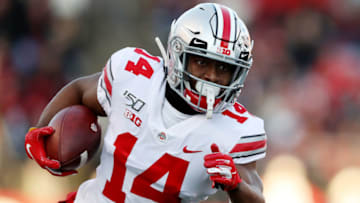 PISCATAWAY, NEW JERSEY - NOVEMBER 16: K.J. Hill #14 of the Ohio State Buckeyes carries the ball in the first quarter against the Rutgers Scarlet Knights at SHI Stadium on November 16, 2019 in Piscataway, New Jersey. (Photo by Elsa/Getty Images)