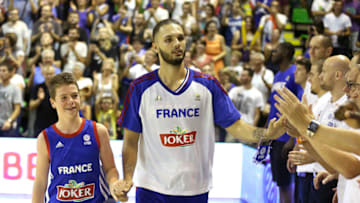 VILLEURBANNE - AUGUST 9: Evan Fournier of France enters the field before the international friendly basketball match between France and Russia in preparation of Euro Basket 2015 at Astroballe Stadium on August 9, 2015 in Villeurbanne, France. (Photo by Jean Catuffe/Getty Images)