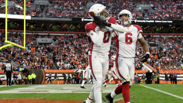 CLEVELAND, OHIO - OCTOBER 17: DeAndre Hopkins #10 of the Arizona Cardinals celebrates a touchdown with teammate James Conner #6 during the third quarter against the Cleveland Browns at FirstEnergy Stadium on October 17, 2021 in Cleveland, Ohio. (Photo by Nick Cammett/Getty Images)