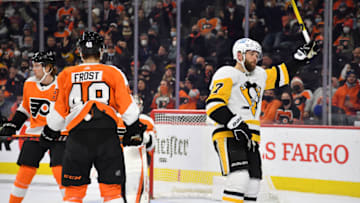 Jan 6, 2022; Philadelphia, Pennsylvania, USA; Pittsburgh Penguins right wing Bryan Rust (17) celebrates his goal against the Philadelphia Flyers during the first period at Wells Fargo Center. Mandatory Credit: Eric Hartline-USA TODAY Sports