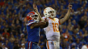 Sep 26, 2015; Gainesville, FL, USA; Tennessee Volunteers place kicker Aaron Medley (25) and Florida Gators defensive back Vernon Hargreaves III (1) react as he missed a 55 yard field goal during the fourth quarter at Ben Hill Griffin Stadium. Florida Gators defeated the Tennessee Volunteers 28-27. Mandatory Credit: Kim Klement-USA TODAY Sports