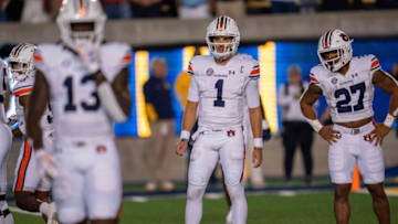 Auburn footballSep 9, 2023; Berkeley, California, USA; Auburn Tigers quarterback Payton Thorne (1) looks in for the play during the first quarter against the California Golden Bears at California Memorial Stadium. Mandatory Credit: Neville E. Guard-USA TODAY Sports