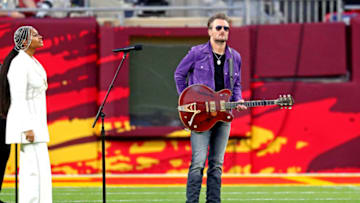 Jazmine Sullivan, Eric Church. (Mandatory Credit: Mark J. Rebilas-USA TODAY Sports)