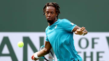 INDIAN WELLS, CA - MARCH 13: Gael Monfils of France returns a shot to Pierre-Hugues Herbert of France during the BNP Paribas Open at the Indian Wells Tennis Garden on March 13, 2018 in Indian Wells, California. (Photo by Matthew Stockman/Getty Images)