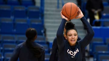 UConn Huskies guard/forward Lexi Gordon (34) works on a passing drill during pregame warm ups before their exhibition game against Southern Connecticut State University at the XL Center. Gordon plans to transfer from the university. (Cloe Poisson/Hartford Courant/TNS via Getty Images)