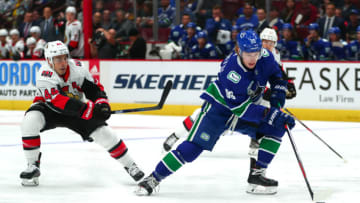 VANCOUVER, BC - SEPTEMBER 25: Vancouver Canucks Center Adam Gaudette (88) skates down ice while watched by Ottawa Senators Center Jean-Gabriel Pageau (44) during their NHL preseason game at Rogers Arena on September 25, 2019 in Vancouver, British Columbia, Canada. (Photo by Devin Manky/Icon Sportswire via Getty Images)