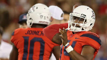 TUCSON, AZ - SEPTEMBER 01: Quarterback Khalil Tate #14 of the Arizona Wildcats throws a pass during warm ups to the college football game against the Brigham Young Cougars at Arizona Stadium on September 1, 2018 in Tucson, Arizona. (Photo by Christian Petersen/Getty Images)