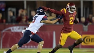 Nov 7, 2015; Los Angeles, CA, USA; Southern California Trojans cornerback Adoree Jackson (2) is defended by Arizona Wildcats punter Josh Pollock (9) on a 40-yard kickoff return in the third quarter at Los Angeles Memorial Coliseum. Mandatory Credit: Kirby Lee-USA TODAY Sports