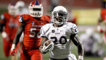 Nov 5, 2015; Fresno, CA, USA; Nevada Wolf Pack running back James Butler (20) carries the ball to score a touchdown against the Fresno State Bulldogs in the fourth quarter at Bulldog Stadium. The Wolf Pack won 30-16. Mandatory Credit: Cary Edmondson-USA TODAY Sports