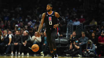 Oct 27, 2021; Los Angeles, California, USA; LA Clippers guard Paul George (13) brings the ball up court in the second half against the Cleveland Cavaliers at Staples Center. Mandatory Credit: Kirby Lee-USA TODAY Sports