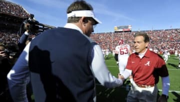 Nov 30, 2013; Auburn, AL, USA; Auburn Tigers head coach Gus Malzahn (left) shakes hands with Alabama Crimson Tide head coach Nick Saban (right) prior to the game at Jordan Hare Stadium. Mandatory Credit: RVR Photos-USA TODAY Sports