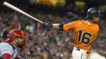 Jun 24, 2016; San Francisco, CA, USA; San Francisco Giants left fielder Angel Pagan (16) singles on a ground ball in front of Philadelphia Phillies catcher Cameron Rupp (29) in the seventh inning at AT&T Park. Mandatory Credit: Neville E. Guard-USA TODAY Sports