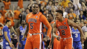 Jan 16, 2016; Auburn, AL, USA; Auburn Tigers forward Cinmeon Bowers (5) and guard Bryce Brown (2) react after Bowers was fouled late in the second half against the Kentucky Wildcats at Auburn Arena. The Tigers beat the Wildcats 75-70. Mandatory Credit: John Reed-USA TODAY Sports