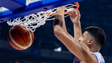 MANILA, PHILIPPINES - SEPTEMBER 09: Simone Fontecchio #13 of Italy dunks the ball during the FIBA Basketball World Cup Classification 7-8 game between Italy and Slovenia at Mall of Asia Arena on September 09, 2023 in Manila, Philippines. (Photo by Ezra Acayan/Getty Images)