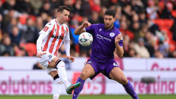 STOKE ON TRENT, ENGLAND - JANUARY 29: Bersant Celina of Stoke City in action with Dan Sweeney of Stevenage during the Emirates FA Cup Fourth Round between Stoke City and Stevenage at Bet365 Stadium on January 29, 2023 in Stoke on Trent, England. (Photo by Marc Atkins/Getty Images)