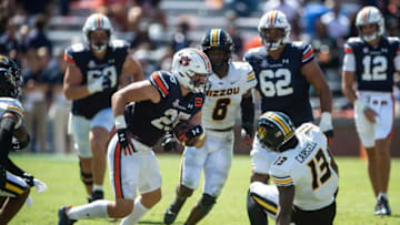 Auburn football tight end John Samuel Shenker (25) turns up field after catching the ball as Auburn Tigers take on Missouri Tigers at Jordan-Hare Stadium in Auburn, Ala., on Saturday, Sept. 24, 2022. Auburn Tigers defeated Missouri Tigers 17-14.
