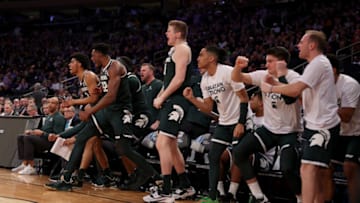 NEW YORK, NEW YORK - MARCH 23: Jaxon Kohler #0 of the Michigan State Spartans reacts with his teammates on the bench against the Kansas State Wildcats during the first half in the Sweet 16 round game of the NCAA Men's Basketball Tournament at Madison Square Garden on March 23, 2023 in New York City. (Photo by Elsa/Getty Images)