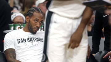 SAN ANTONIO,TX - DECEMBER 18 : Kawhi Leonard #2 of the San Antonio Spurs sits on the bench late in second quarter during game against the Los Angeles Clippers at AT&T Center on December 18, 2017 in San Antonio, Texas. NOTE TO USER: User expressly acknowledges and agrees that , by downloading and or using this photograph, User is consenting to the terms and conditions of the Getty Images License Agreement. (Photo by Ronald Cortes/Getty Images)