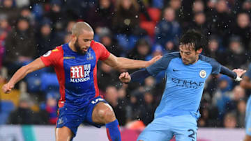 Crystal Palace's English midfielder Andros Townsend (L) vies with Manchester City's Spanish midfielder David Silva (R) during the English FA Cup fourth round football match between Crystal Palace and Manchester City at Selhurst Park in south London on January 28, 2017. / AFP / Ben STANSALL / RESTRICTED TO EDITORIAL USE. No use with unauthorized audio, video, data, fixture lists, club/league logos or 'live' services. Online in-match use limited to 75 images, no video emulation. No use in betting, games or single club/league/player publications. / (Photo credit should read BEN STANSALL/AFP/Getty Images)