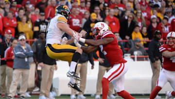 LINCOLN, NE - NOVEMBER 24: Defensive back Tony Butler #2 of the Nebraska Cornhuskers runs into punter Colten Rastetter #7 of the Iowa Hawkeyes at Memorial Stadium on November 24, 2017 in Lincoln, Nebraska. (Photo by Steven Branscombe/Getty Images)