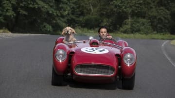 L-R: “Enzo” and Milo Ventimiglia in Twentieth Century Fox’s, THE ART OF RACING IN THE RAIN