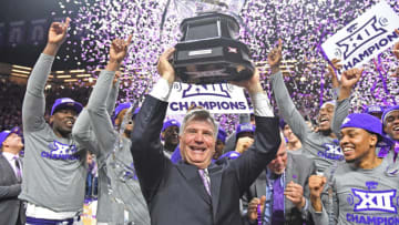 MANHATTAN, KS - MARCH 09: Head coach Bruce Weber (C) of the Kansas State Wildcats and his players celebrate after wining the Big 12 Regular Season Championship on March 9, 2019 at Bramlage Coliseum in Manhattan, Kansas. (Photo by Peter G. Aiken/Getty Images)