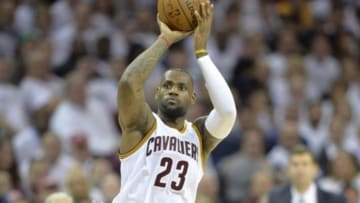 Apr 21, 2015; Cleveland, OH, USA; Cleveland Cavaliers forward LeBron James (23) shoots in the fourth quarter against the Boston Celtics in game two of the first round of the NBA Playoffs at Quicken Loans Arena. Mandatory Credit: David Richard-USA TODAY Sports