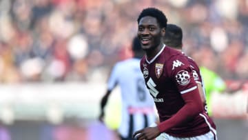 TURIN, ITALY - FEBRUARY 10: Ola Aina of Torino FC celebrates the opening goal during the Serie A match between Torino FC and Udinese at Stadio Olimpico di Torino on February 10, 2019 in Turin, Italy. (Photo by Valerio Pennicino/Getty Images)