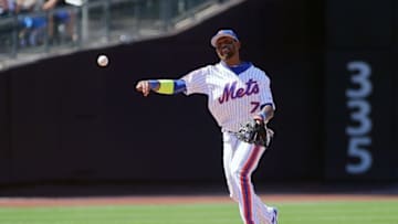 Aug 28, 2016; New York City, NY, USA; New York Mets shortstop Jose Reyes (7) throws to first against the Philadelphia Phillies during the fifth inning at Citi Field. The Phillies won 5-1. Mandatory Credit: Andy Marlin-USA TODAY Sports