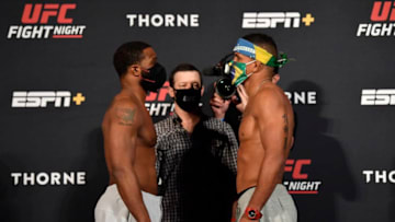 Tyron Woodley and Gilbert Burns (Photo by Jeff Bottari/Zuffa LLC)