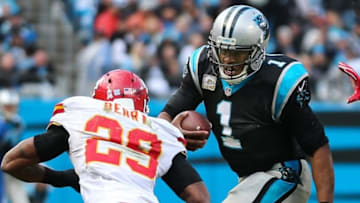 Nov 13, 2016; Charlotte, NC, USA; Carolina Panthers quarterback Cam Newton (1) tries to evade Kansas City Chiefs strong safety Eric Berry (29) during the second half at Bank of America Stadium. The Chiefs won 20-17. Mandatory Credit: Jim Dedmon-USA TODAY Sports