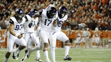 Nov 27, 2014; Austin, TX, USA; TCU Horned Frogs safety Sam Carter (17) celebrates with teammates after intercepting a pass against the Texas Longhorns during the game at Darrell K Royal-Texas Memorial Stadium. Mandatory Credit: Brendan Maloney-USA TODAY Sports