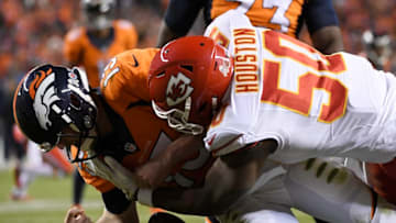 DENVER, CO - NOVEMBER 27: Kansas City Chiefs outside linebacker Justin Houston (50) sacks and forces a fumble that would lead to a safety on Denver Broncos quarterback Trevor Siemian (13) during the second quarter on Sunday, November 27, 2016. The Denver Broncos hosted the Kansas City Chiefs. (Photo by Joe Amon/The Denver Post via Getty Images)