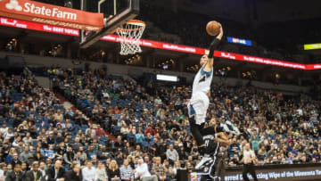 Mar 5, 2016; Minneapolis, MN, USA; Minnesota Timberwolves guard Zach LaVine (8) dunks as Brooklyn Nets guard Wayne Ellington (21) looks on during the second quarter at Target Center. Mandatory Credit: Jeffrey Becker-USA TODAY Sports