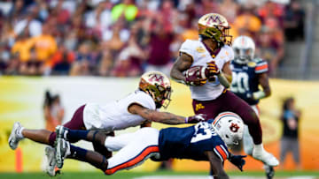 Auburn footballJan 1, 2020; Tampa, Florida, USA; Minnesota Golden Gophers running back Rodney Smith (1) runs the ball as Auburn Tigers defensive back Roger McCreary (23) defends during the fourth quarter at Raymond James Stadium. Mandatory Credit: Douglas DeFelice-USA TODAY Sports