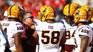 Nov 28, 2014; Tucson, AZ, USA; Arizona State Sun Devils head coach Todd Graham in the huddle with players against the Arizona Wildcats during the 88th annual territorial cup at Arizona Stadium. Mandatory Credit: Mark J. Rebilas-USA TODAY Sports