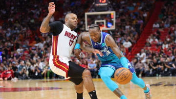 Terry Rozier #3 of the Charlotte Hornets drives to the basket against P.J. Tucker #17 of the Miami Heat(Photo by Michael Reaves/Getty Images)