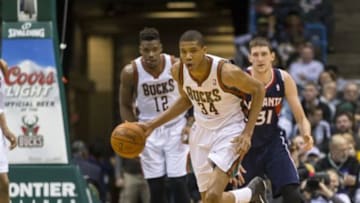 Apr 16, 2014; Milwaukee, WI, USA; Milwaukee Bucks guard Giannis Antetokounmpo (34) heads up court with the ball during the fourth quarter against the Atlanta Hawks at BMO Harris Bradley Center. Atlanta won 111-103. Mandatory Credit: Jeff Hanisch-USA TODAY Sports