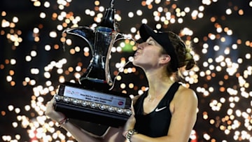 DUBAI, UNITED ARAB EMIRATES - FEBRUARY 23: Belinda Bencic of Switzerland celebrates with the trophy after winning her Final Match against Petra Kvitova of Czech Republic on day seven of the Dubai Duty Free Tennis Stadium on February 23, 2019 in Dubai, United Arab Emirates. (Photo by Tom Dulat/Getty Images)