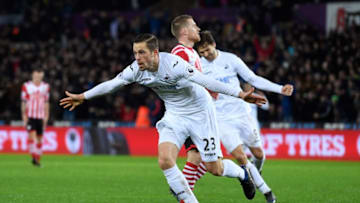 SWANSEA, WALES - JANUARY 31: Gylfi Sigurdsson of Swansea City celebrates scoring his sides second goal during the Premier League match between Swansea City and Southampton at Liberty Stadium on January 31, 2017 in Swansea, Wales. (Photo by Stu Forster/Getty Images)