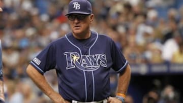 Aug 21, 2014; St. Petersburg, FL, USA; Tampa Bay Rays manager Joe Maddon (70) looks on during the eighth inning against the Detroit Tigers at Tropicana Field. Tampa Bay Rays defeated the Detroit Tigers 1-0. Mandatory Credit: Kim Klement-USA TODAY Sports