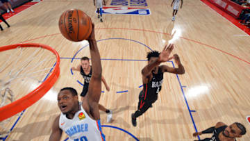 Deonte Burton, OKC Thunder dunks the ball during the game against the Portland Trail Blazers (Photo by David Dow/NBAE via Getty Images)