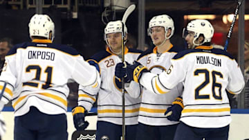 Jan 3, 2017; New York, NY, USA; Buffalo Sabres center Jack Eichel (15) celebrates his goal against the New York Rangers with Buffalo Sabres right wing Kyle Okposo (21) and Buffalo Sabres center Sam Reinhart (23) and Buffalo Sabres left wing Matt Moulson (26) during the third period at Madison Square Garden. Mandatory Credit: Brad Penner-USA TODAY Sports