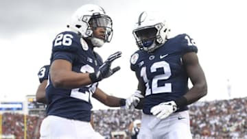 Jan 2, 2017; Pasadena, CA, USA; Penn State Nittany Lions running back Saquon Barkley (26) celebrates making a touchdown with wide receiver Chris Godwin (12) against the USC Trojans during the second quarter of the 2017 Rose Bowl game at Rose Bowl. Mandatory Credit: Robert Hanashiro-USA TODAY Sports