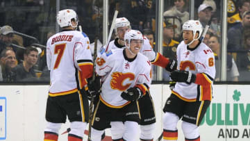 Nov 25, 2016; Boston, MA, USA; Calgary Flames center Sam Bennett (93) is congratulated by his teammates after scoring a goal during the first period against the Boston Bruins at TD Garden. Mandatory Credit: Bob DeChiara-USA TODAY Sports