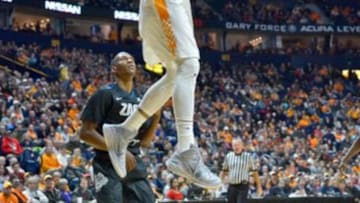 Dec 18, 2016; Nashville, TN, USA; Tennessee Volunteers guard Robert Hubbs III (3) dunks the ball against the Gonzaga Bulldogs during the first half of the Battle on Broadway at Bridgestone Arena. Mandatory Credit: Jim Brown-USA TODAY Sports