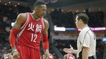 Feb 6, 2016; Houston, TX, USA; Houston Rockets center Dwight Howard (12) argues a call with official Brian Forte (45) while playing against the Portland Trail Blazers in the second quarter at Toyota Center. Mandatory Credit: Thomas B. Shea-USA TODAY Sports