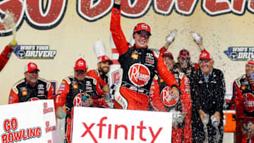 RICHMOND, VIRGINIA - SEPTEMBER 20: Christopher Bell, driver of the #20 Rheem Toyota, celebrates in Victory Lane after winning the NASCAR Xfinity Series GoBowling 250 at Richmond Raceway on September 20, 2019 in Richmond, Virginia. (Photo by Brian Lawdermilk/Getty Images)